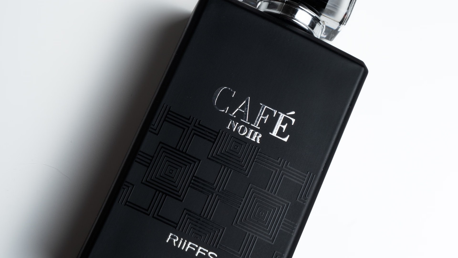 Café Noir dark matte perfume editorial